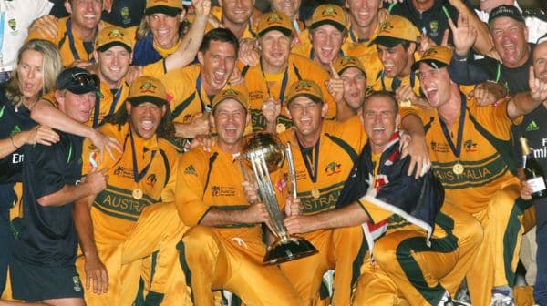 Australian team posing with World Cup trophy